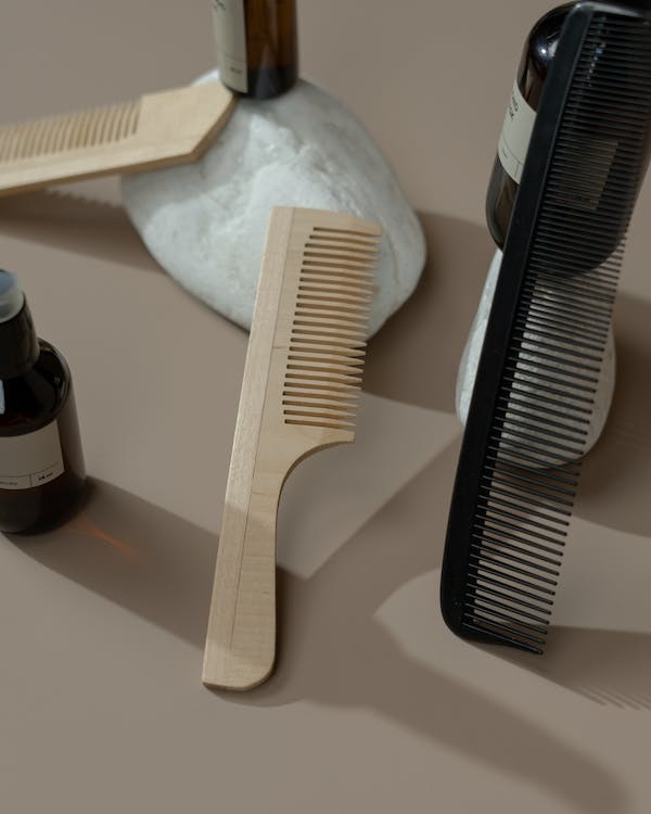 Wooden and plastic combs