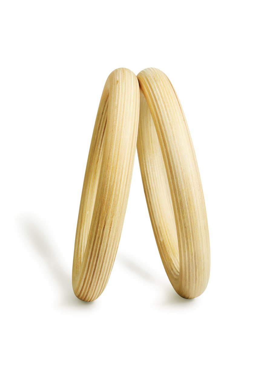 Pair of Wooden Rings Standing on White Background