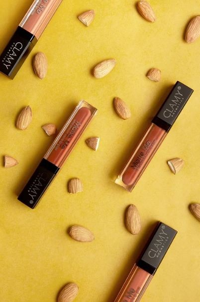a collection of liquid lipstick, nuts