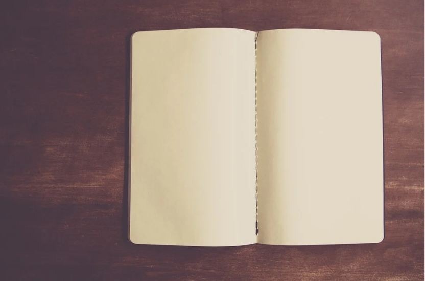 an open, empty notebook