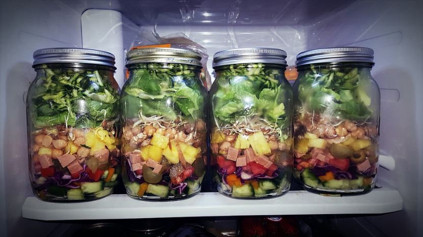 mason jar salads in a fridge