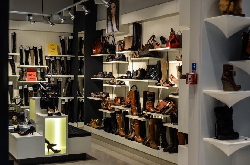 shoe shop, different styles of boots, different styles of shoes, bag
