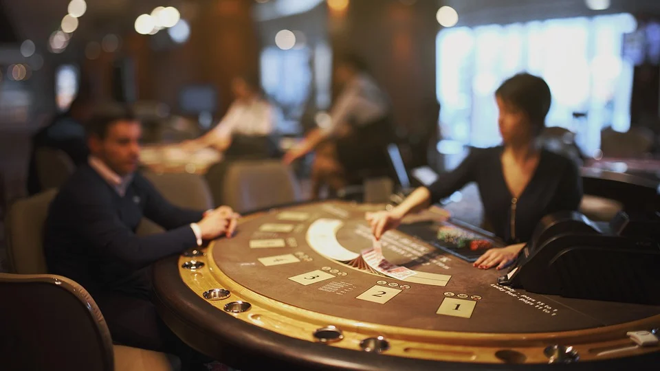 casino table with a well-dressed player