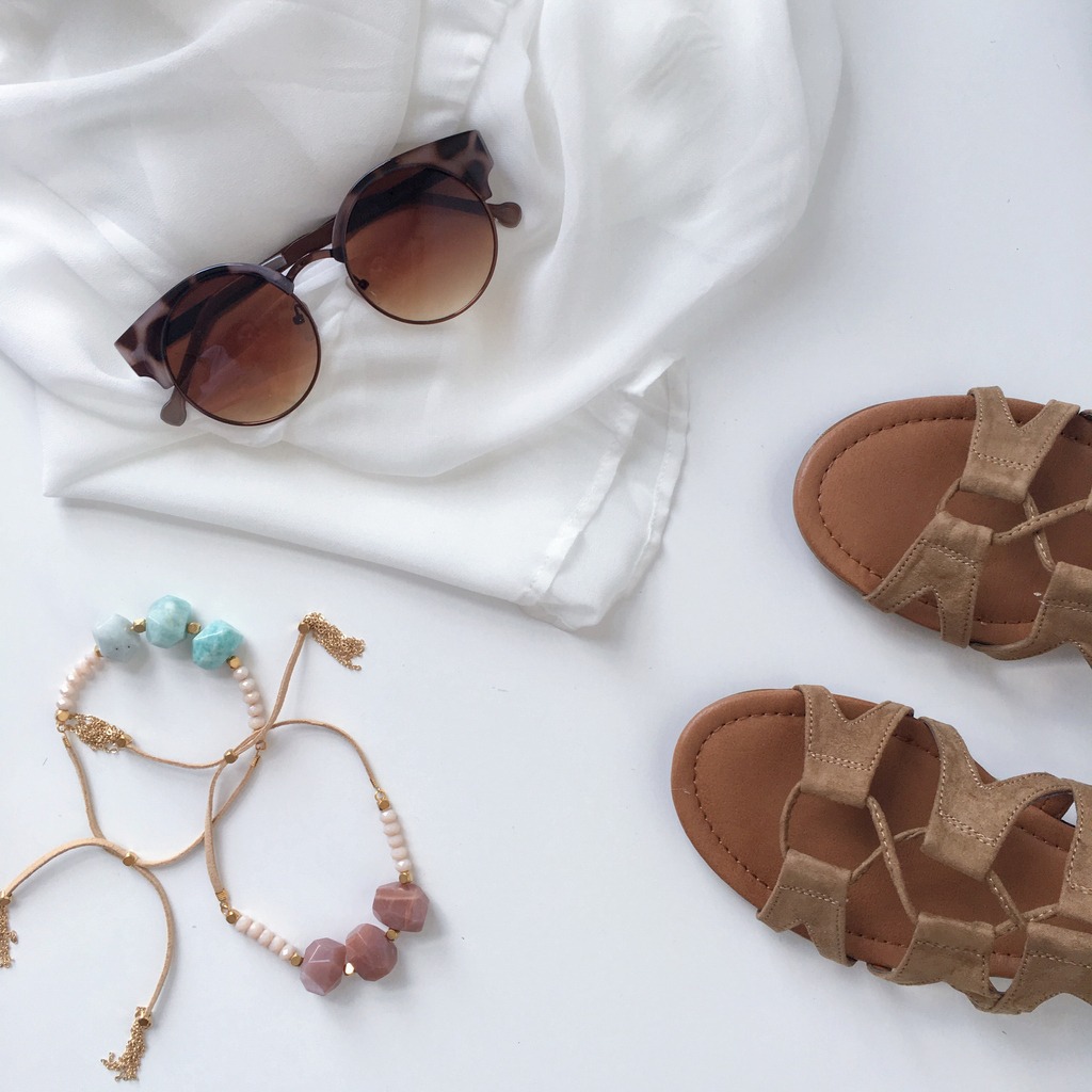 Brown Gladiator sandals and some accessories