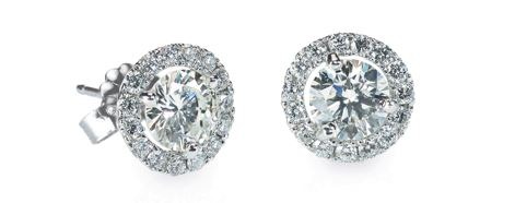 Diamond stud earrings in halo setting