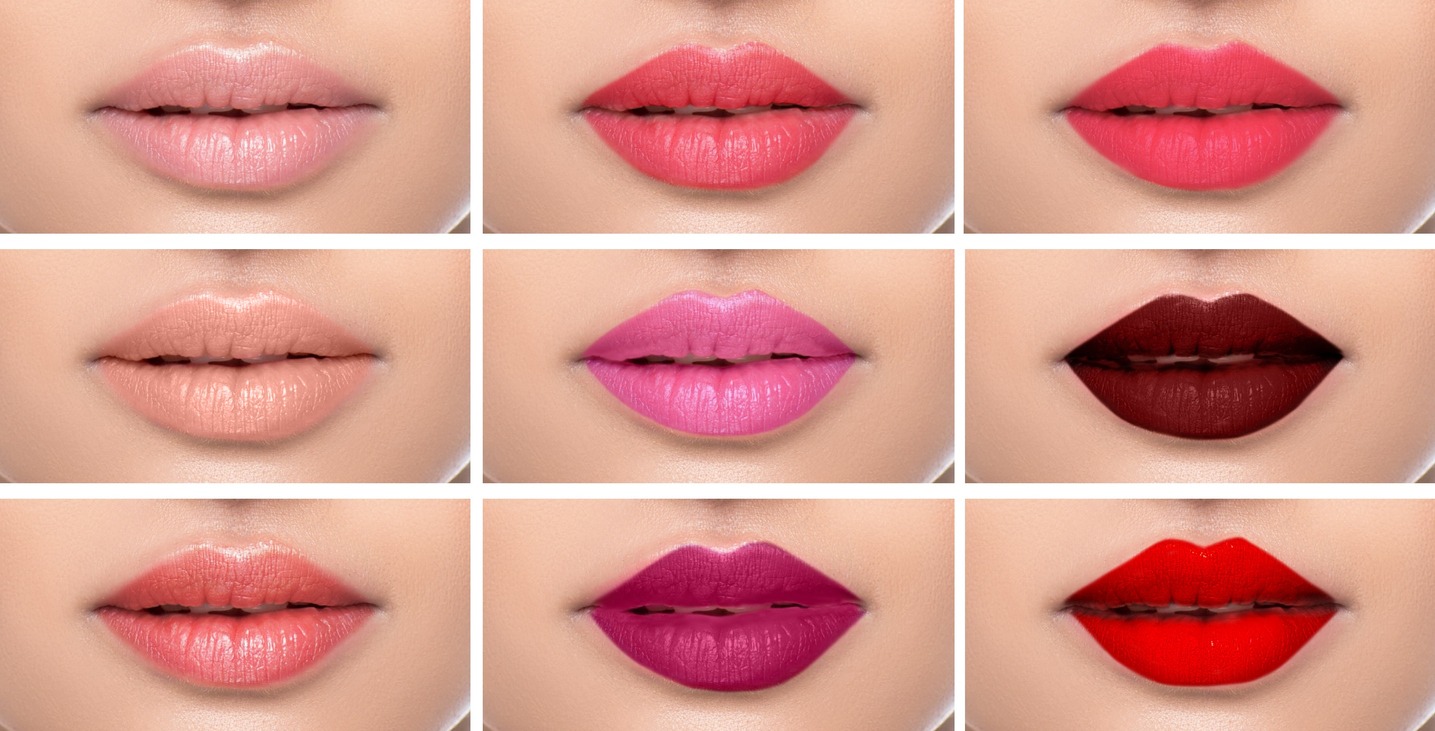 Different color of lipsticks on the female lips