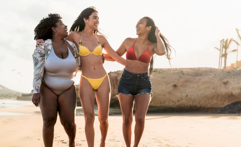 happy-multiracial-females-with-different-body-size-having-fun