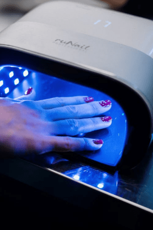 letting-gel-manicure-dry-under-UV-light