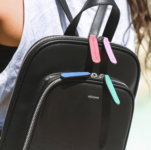 A black backpack made of eco-friendly apple peel vegan leather