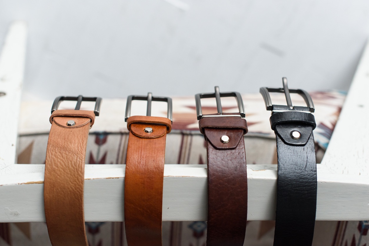 A set of colorful men’s genuine suede leather belts
