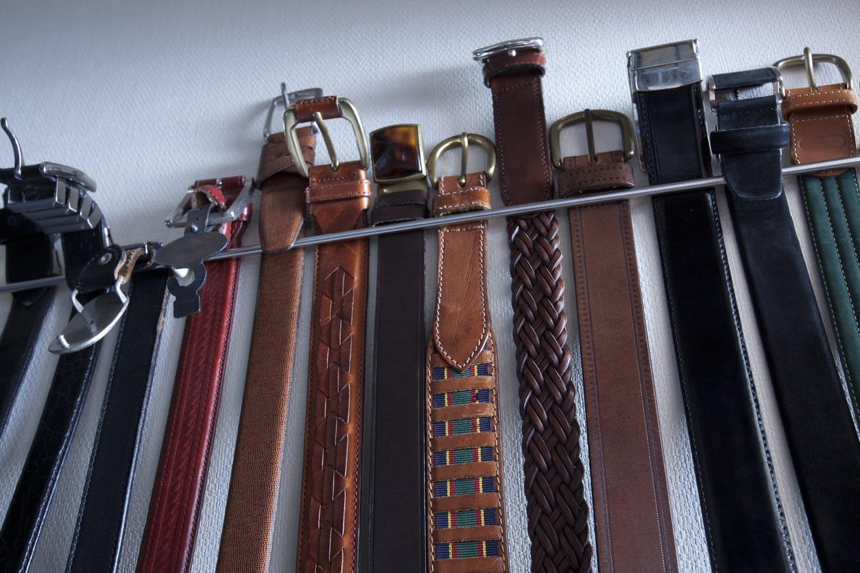 Belts hanging in a rack