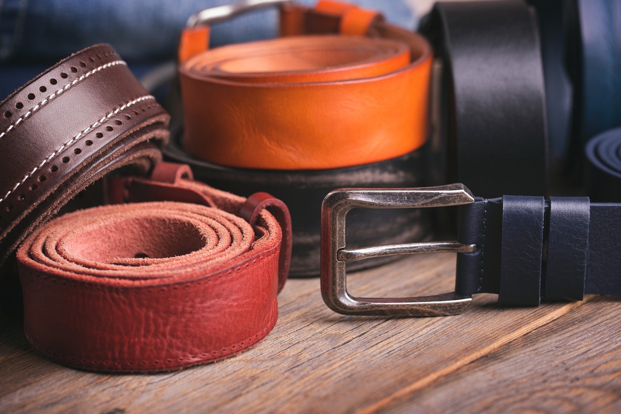 Belts on a wooden table