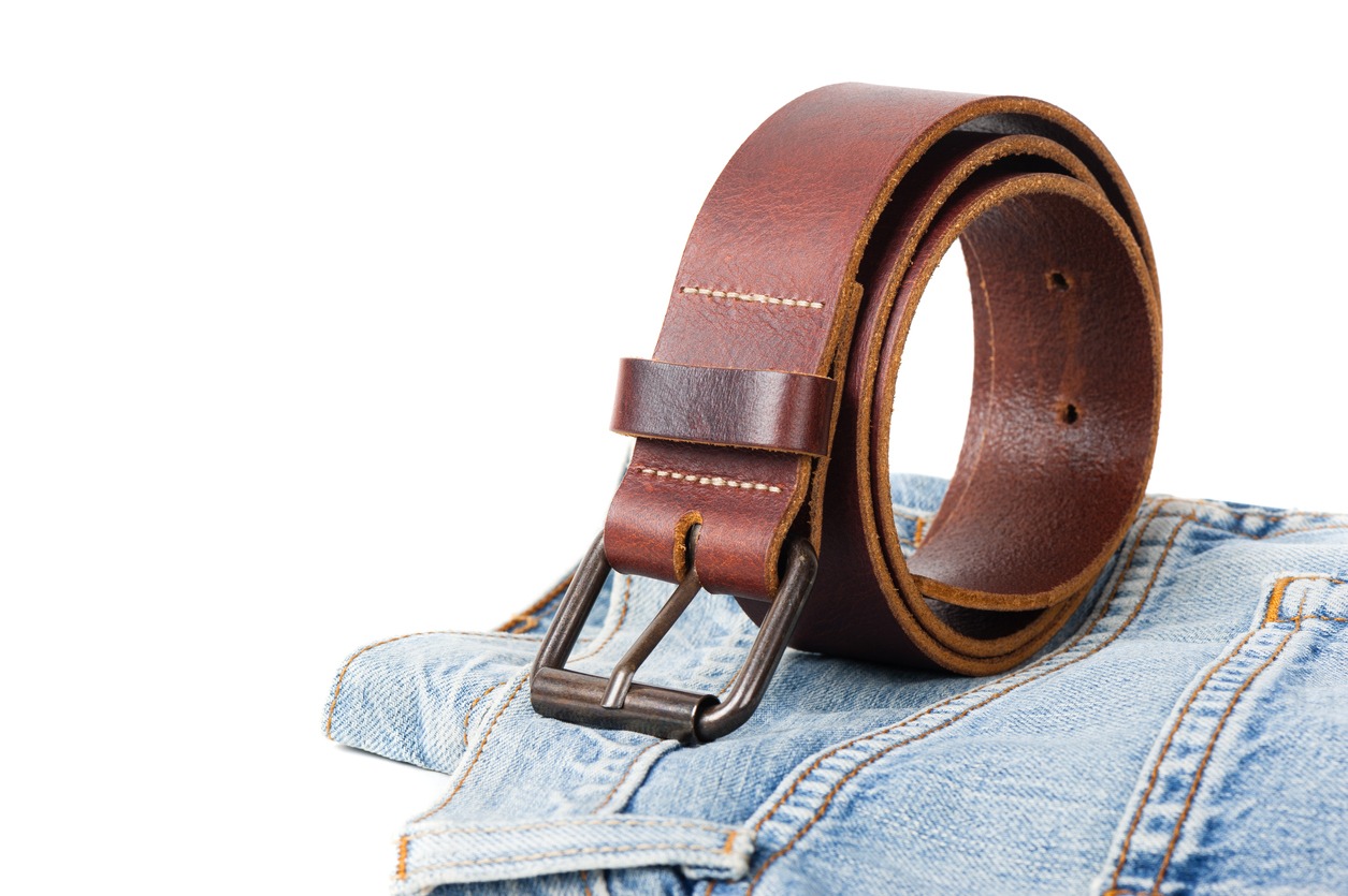 Brown leather belt with metal buckle