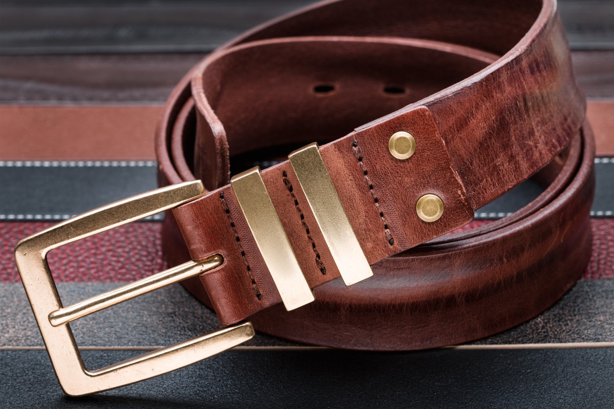 Brown men leather belt with golden buckle