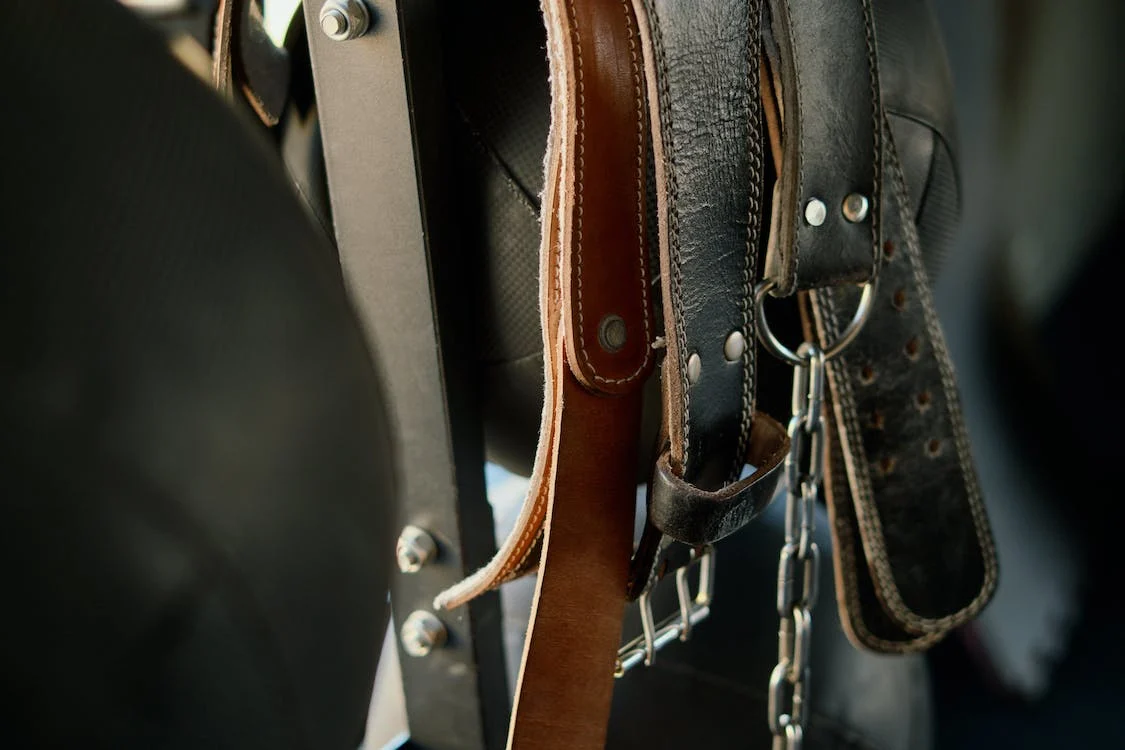 Leather belts in a rack