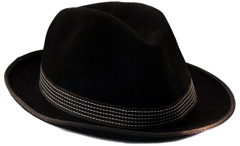 a black Homburg hat