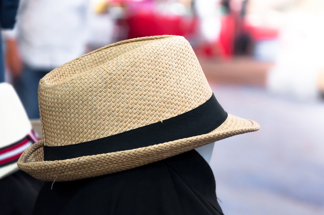Woven fedora hat on street market