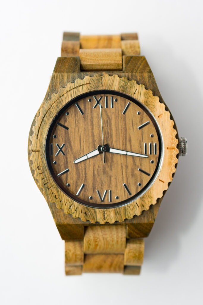 Interesting Wooden Watch on White Background Top View