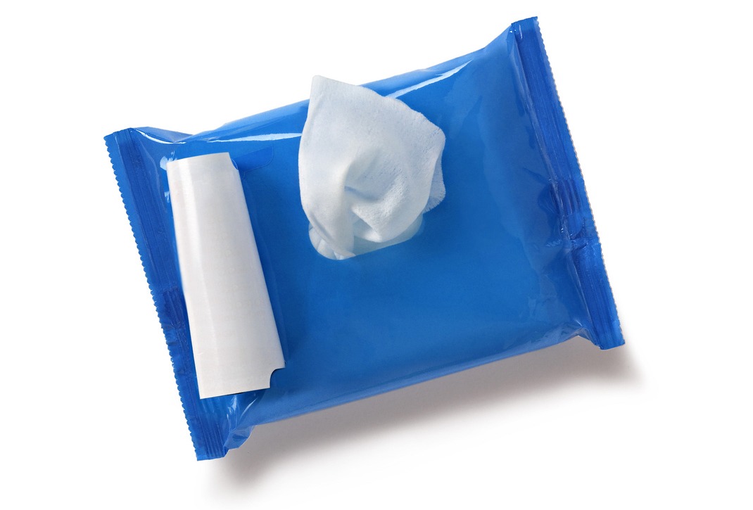 peeking wet wipes on a blue pack is displayed on a white background