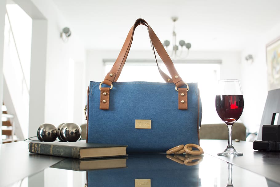 A-denim-handbag-placed-on-a-table