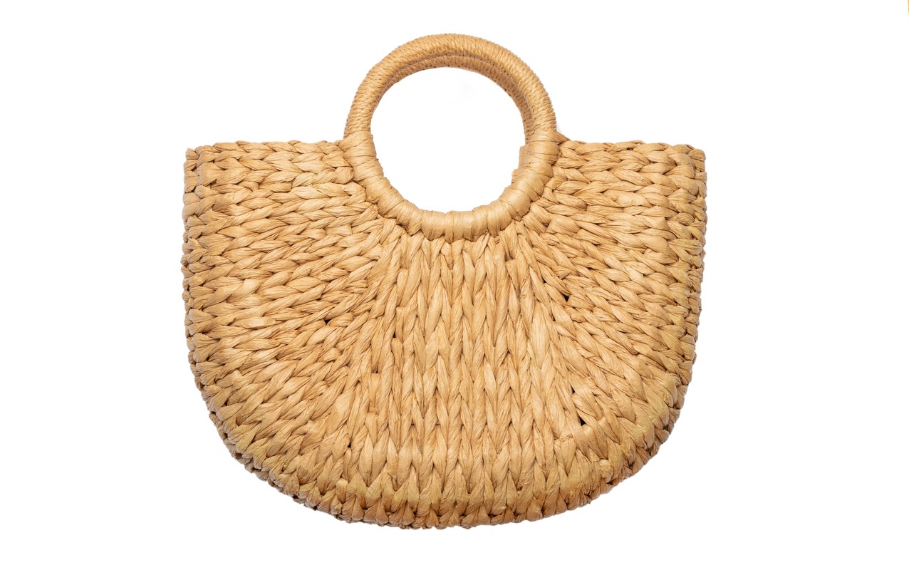 A wicker straw basket bag