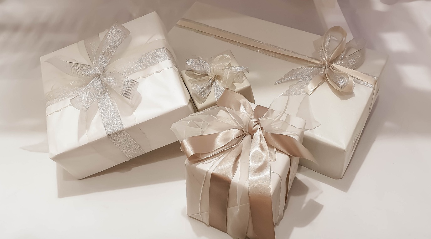 Beige gift boxes with ribbon