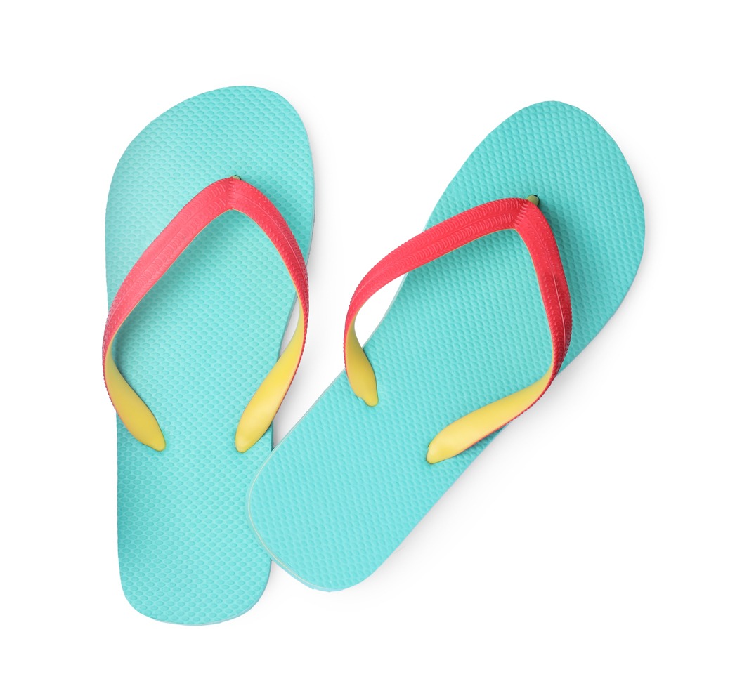 Flip flops in turquoise, isolated on a white backdrop