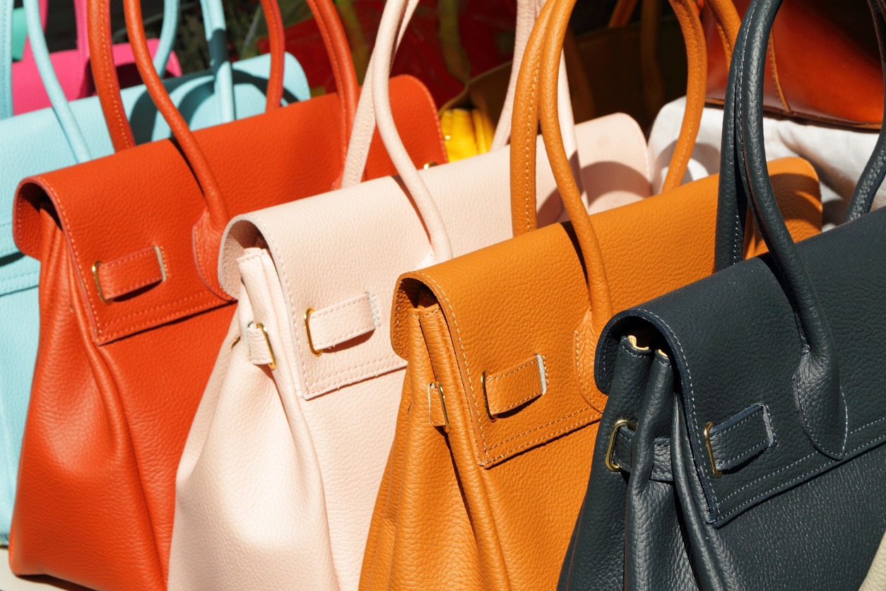 Leather handbags in the same style but different colors