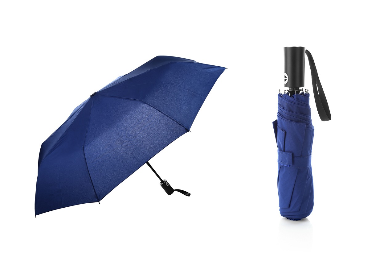 Lightweight folding blue umbrella with six panels, isolated on white