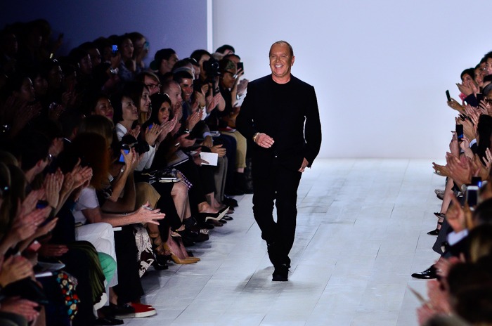 Kors at the conclusion of his Spring/Summer 2014 show at New York Fashion Week, September 2013