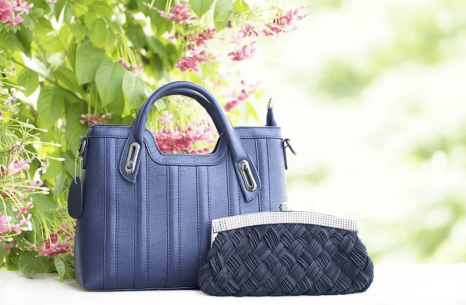 a-blue-hand-bag-and-a-blue-purse
