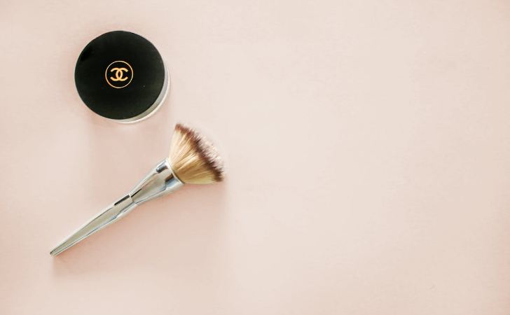 a-brush-and-small-cosmetics-container-by-Chanel