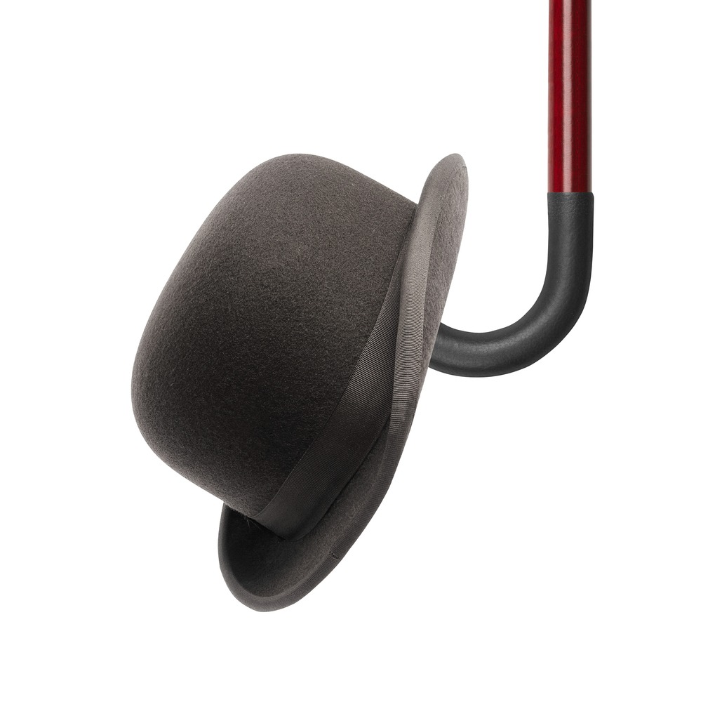 walking stick and black bowler cap isolated on white background