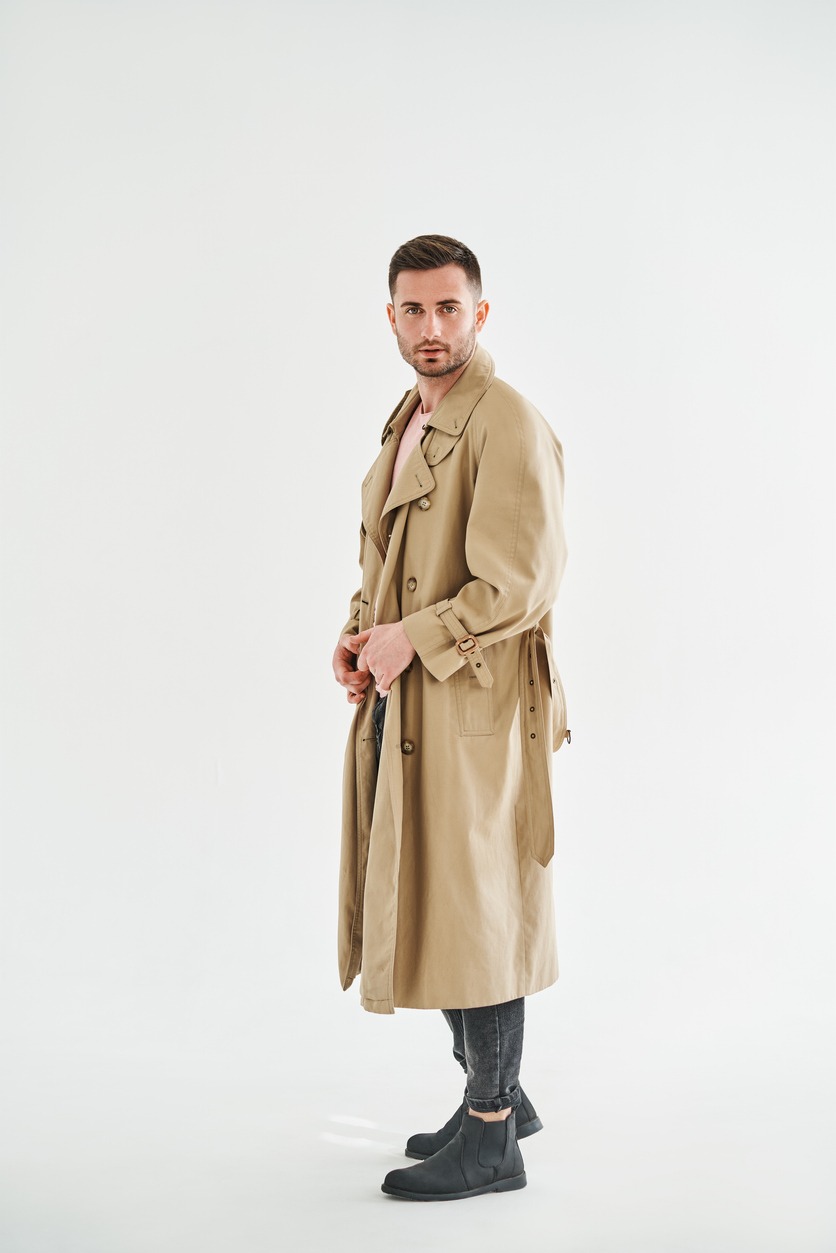 Young Trendy Man in Beige Trench Coat