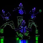 dancers in LED suits