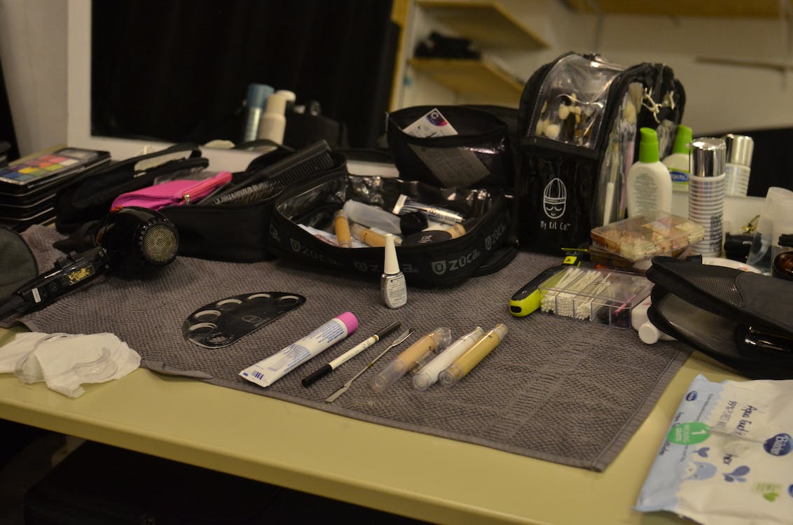 various cosmetic products arranged on the table in beauty salon
