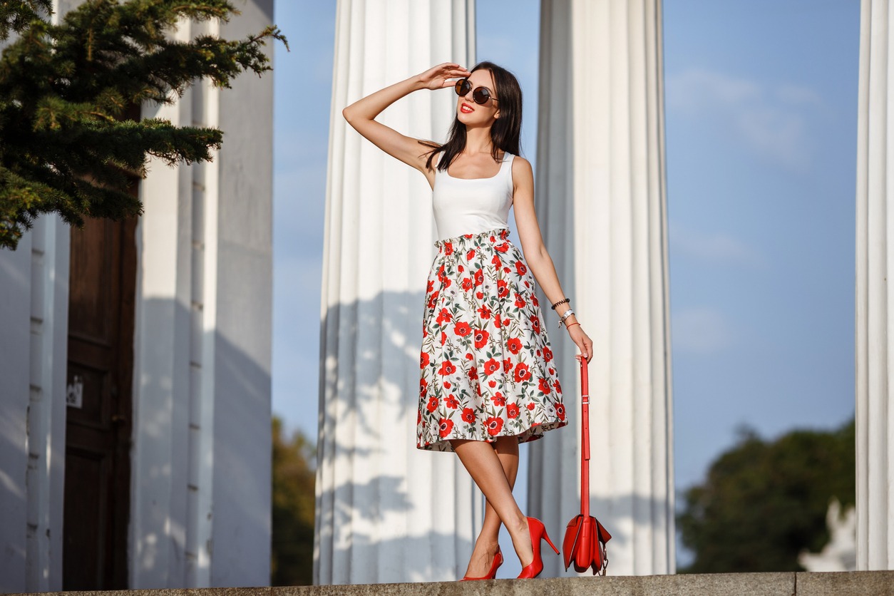 woman wearing a floral A-line skirt