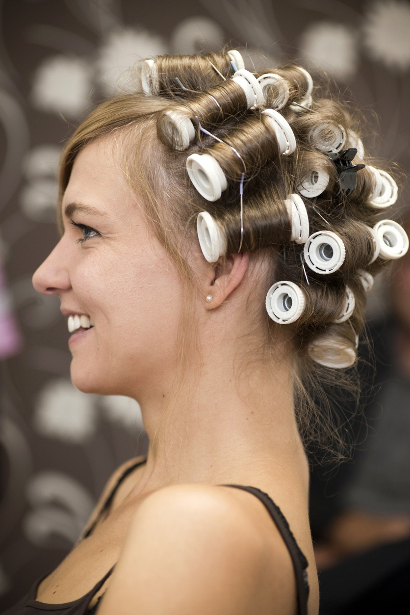 woman with lots of hair rollers