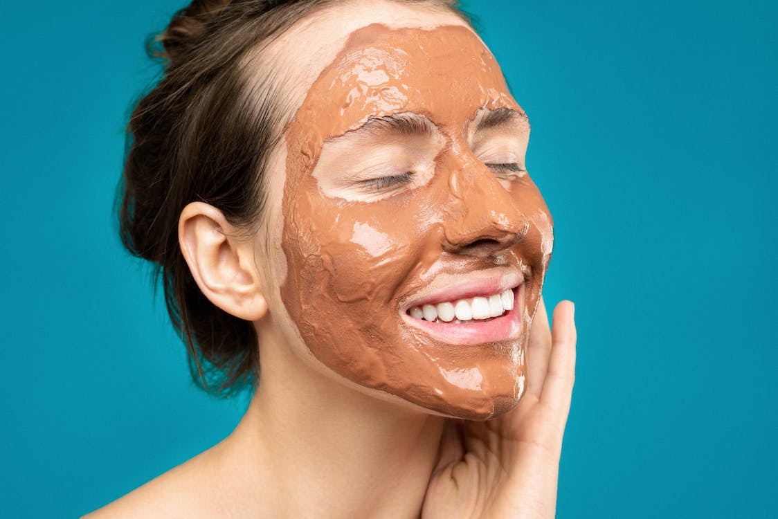 Woman-With-Clay-Mask-on-Face