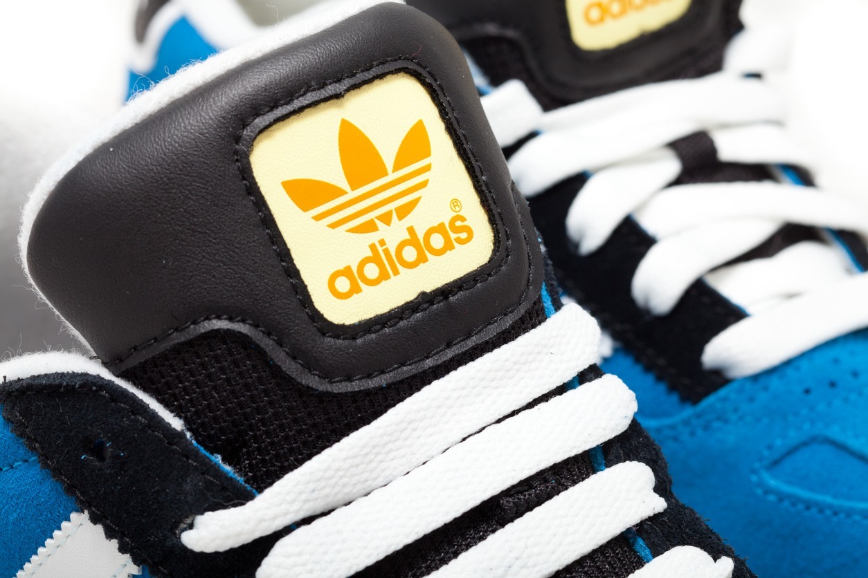 adidas logo on white running shoe