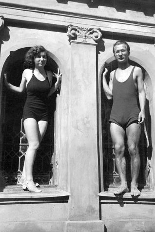 man-and-woman-wearing-one-piece-swimwear