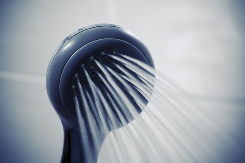 showerhead-spraying-water