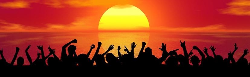silhouettes-of-people-partying-sunset